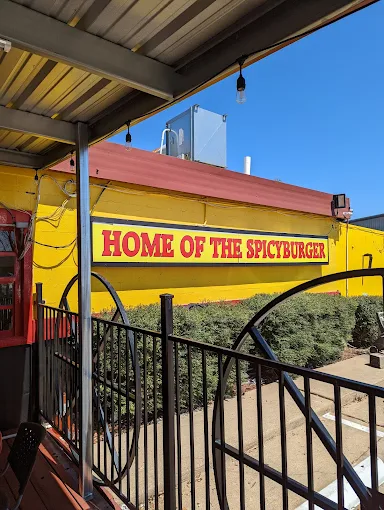 Home of the Spicy Burger sign